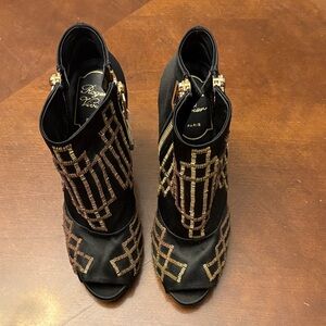 Roger Vivier Black and Gold Heeled Boots